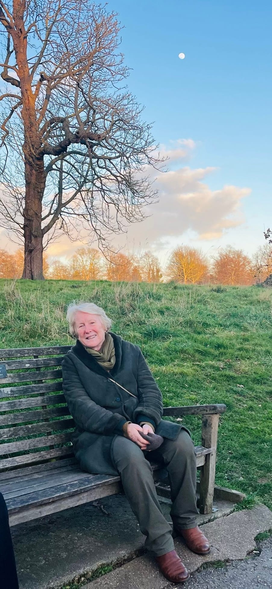 Alice Groh seated outdoors on a bench